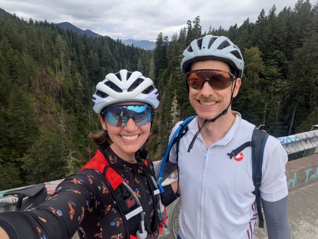 Two people biking