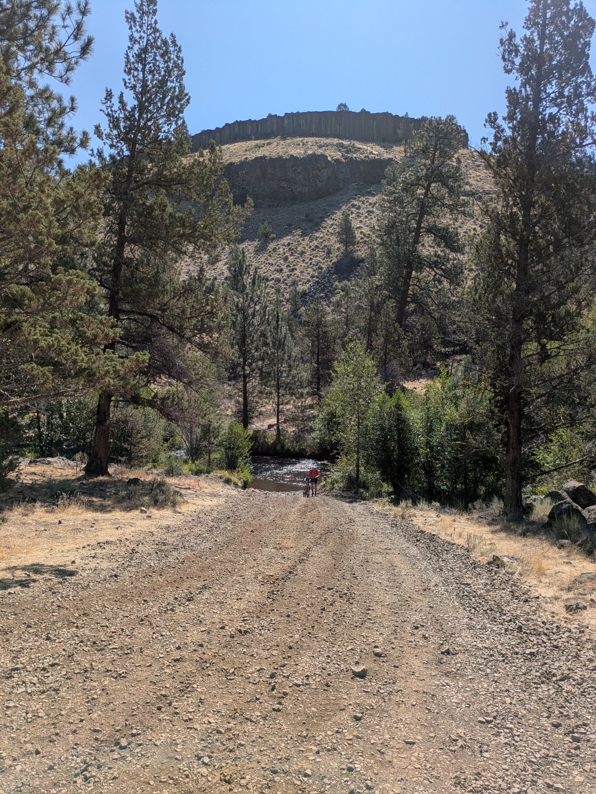 Gravel bike route in Sisters, OR with creek crossing.