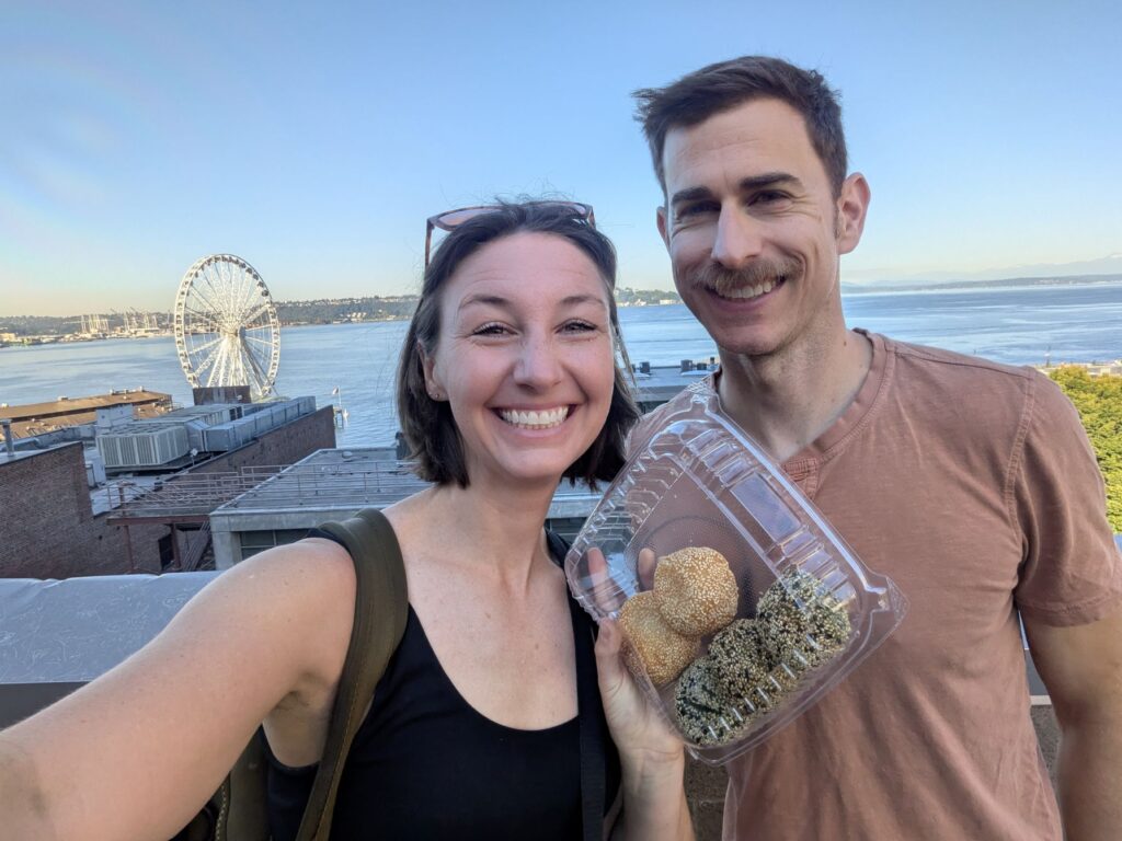 Two people with sesame buns in Seattle